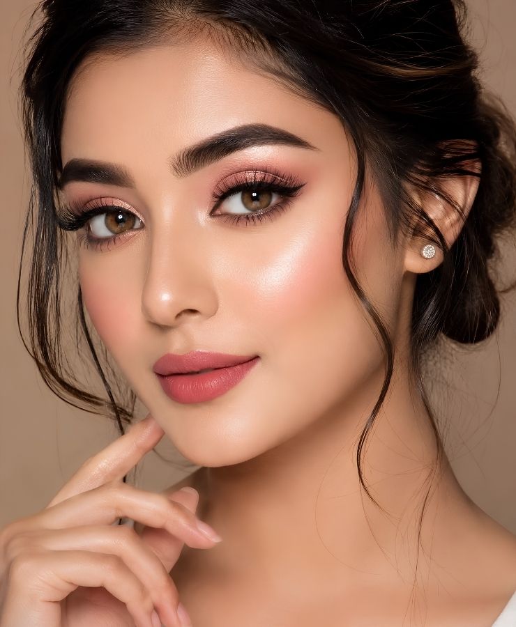 Student learning basic makeup artistry techniques at LA International Makeup Academy